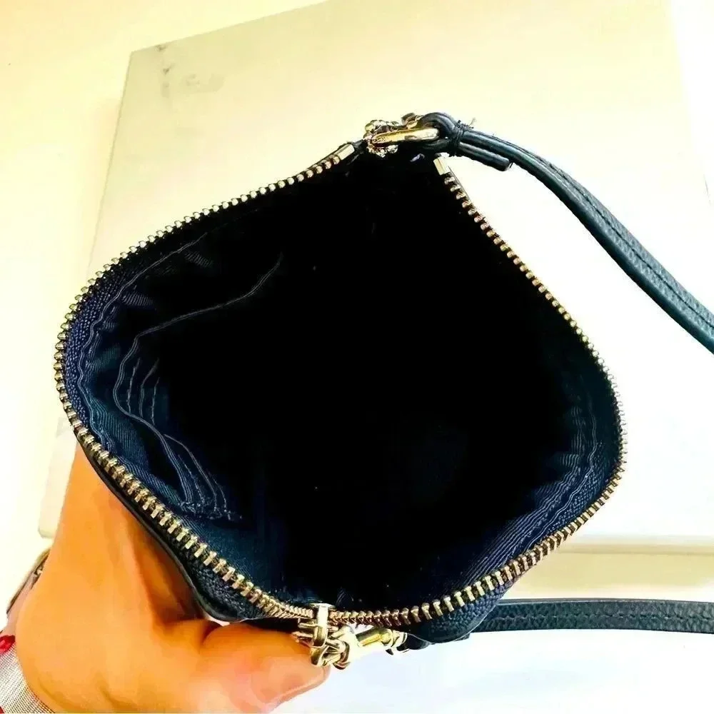 Coach Corner Zip Wristlet In Signature Leather